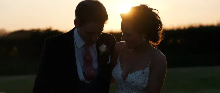 Bride and groom portrait during golden hour in the countryside
